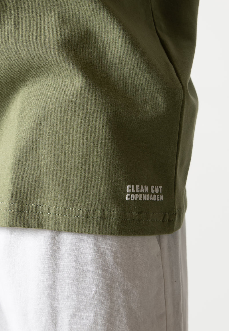 Clean Cut Copenhagen Cross logo organic t-shirt T-shirts S/S Dusty Green
